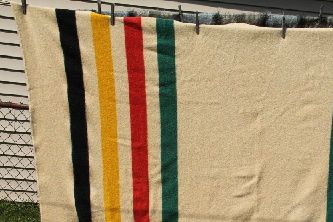 Pictured is a vintage 1950's wool blanket. These cost more nowadays, but they last for many, many years.