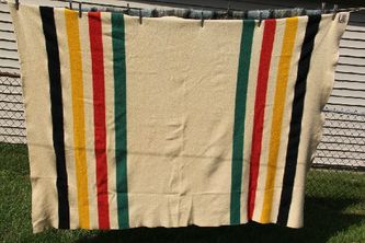 Pictured is a vintage 1950's wool blanket. These cost more nowadays, but they last for many, many years.
