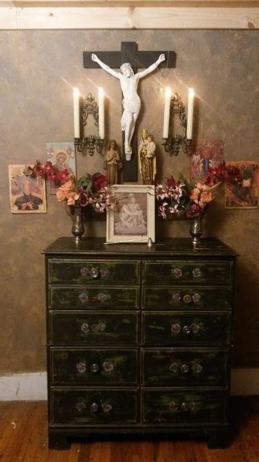 Your home may not have space for an oratory (prayer room), but whatever space you have, make it inspiring for you! Notice how this home altar creates that triangle that draws the mind upwards to God. This beautiful home altar can be found on Pinterest.